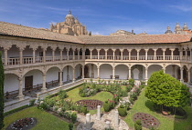 Spain, Castile and Leon, Salamanca, Convento de las Duenas which is a Dominican convent built in the 15th and 16th centuries, view from the upper cloister with Salamanca Cathedral in the background.