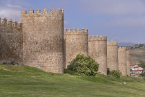 Spain, Castile and Leon, Avila, City walls that were built from 1090 onwards and are among the best-preserved and most complete in Europe, looking along the northern section of the walls.