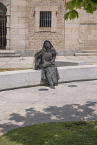 Spain, Castile and Leon, Avila, Basilica de Santa Teresa, statue of the saint outside the basilica.
