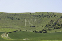 England, East Sussex, Wilmington, The Longman figure carved into the chalk hillside of Windover Hill, 235 feet tall and depicted holding two staves.