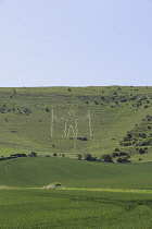 England, East Sussex, Wilmington, The Longman figure carved into the chalk hillside of Windover Hill, 235 feet tall and depicted holding two staves.