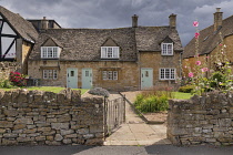 England, Worcestershire, Broadway,  Typical semi detached Cotswold cottages.