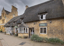 England, Worcestershire, Broadway, Broadway Chocolate shop facade with thatched roof.