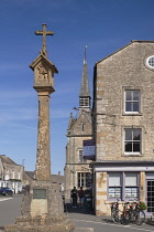 England, Gloucestershire, Stow on the Wold, Market Cross with a plaque to commemorate the Battle of Stow in 1646 that was added in 2012,  the plaque is a symbolic reminder to market traders during med...