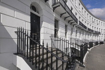 England, Gloucestershire, Cheltenham, The Royal Crescent a terrace of 18 houses built in between 1806-10 as fashionable lodgings for visitors to the Spa, the Duke of Gloucester lived at No 18 when he...