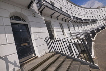 England, Gloucestershire, Cheltenham, The Royal Crescent a terrace of 18 houses built in between 1806-10 as fashionable lodgings for visitors to the Spa, the Duke of Gloucester lived at No 18 when he...