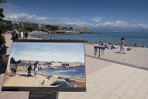 France, Provence-Alpes-Cote d'Azur, Antibes, Old town ramparts and coastline, sign with painting on Plage du Ponteil.