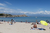 France, Provence-Alpes-Cote d'Azur, Antibes, people sunbathing on Plage du Ponteil.