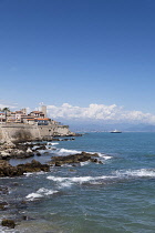 France, Provence-Alpes-Cote d'Azur, Antibes, Old town ramparts and coastline, looking toward the Picasso museum from Av. du General Maiziere.