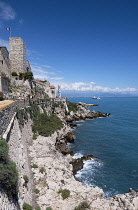 France, Provence-Alpes-Cote d'Azur, Antibes, Old town ramparts and coastline, view toward the Picasso museum.