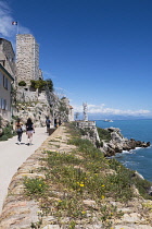 France, Provence-Alpes-Cote d'Azur, Antibes, Old town ramparts and coastline, view toward the Picasso museum.