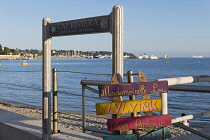 France, Provence-Alpes-Cote d'Azur, Antibes, Juan-les-Pins, Restaurant sign on sandy beach.