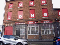 Ireland, North, Belfast, Exterior of John Longs Fish and Chips Shop in Athol Street, named best in Uk 2024.