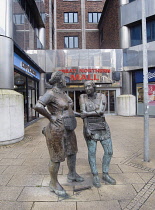 Ireland, North, Belfast, Great Victoria Street, Sculpture of the Unknown Worker outside the Great Northern Mall.