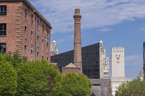 England, Lancashire, Liverpool, Royal Albert Dock, general vista with the Pump House tower and the Three Graces in the background.