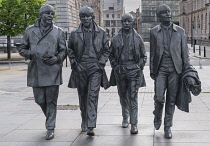 England, Lancashire, Liverpool, Pier Head, Statue of the Beatles by Andrew Edwards created in 2015.