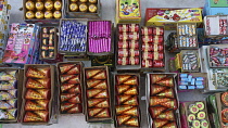 India, Gujarat, Ahmedabad,Fireworks on sale in the market.