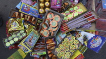 India, Gujarat, Ahmedabad,Fireworks on sale in the market.