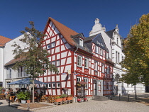 Germany, Hesse, Idstein, Marktplatz, Half timbered house on the corner of the Market Square which houses the Zum Tal Gasthaus in the Altstadt or Old Town area.