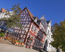 Germany, Hesse, Idstein, Marktplatz, Half timbered house on the corner of the Market Square which houses the Zum Tal Gasthaus in the Altstadt or Old Town area.