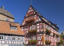 Germany, Hesse, Idstein, Half timbered Gasthaus Zur Peif  decorated with flower boxes in the Altstadt or Old Town area.