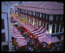 Singapore, Chinatown, Trengganu Street at night  evening market for Chinese New Year  lanterns.