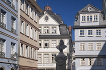 Germany, Hesse, Frankfurt, New Old Town area with the fountain and statue of the poet Friedrich Stoltze at the Chicken Market Square.