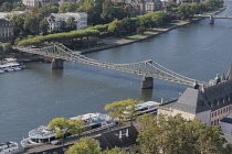 Germany, Hesse, Frankfurt, view of the Main river and the pedestrian Eiserner Steg bridge from the tower of the post WW2 restored Frankfurt Cathedral or Frankfurter Dom, the Imperial Cathedral of Sain...